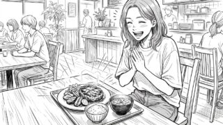 ハンバーグを前にする女性