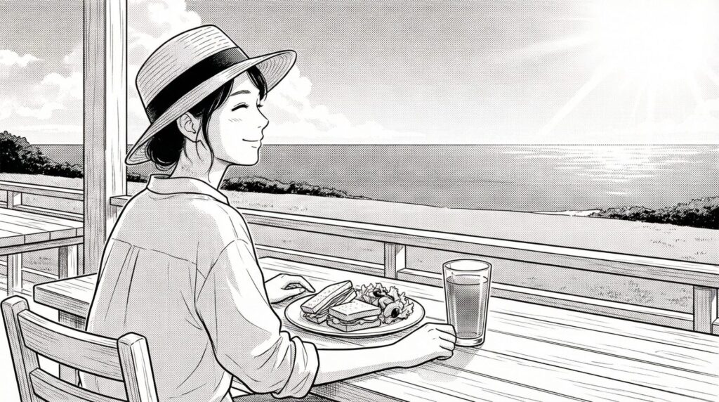 テラス席から海を眺めながら食事をする